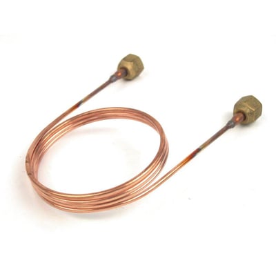 Nærbillede af Danfoss 1 meter kapillarrør til trykregulator, viser 1/4" kobberrør med messingfittings.