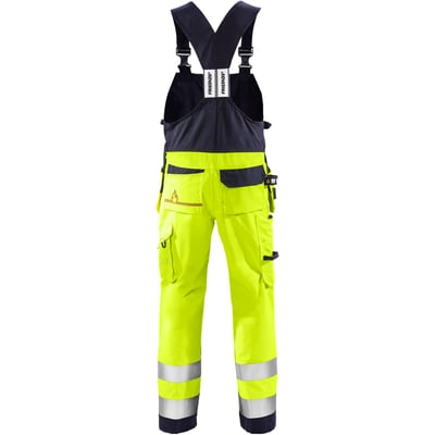 Kansas Fristads Flamestat Hi-Vis overalls i gul og marineblå, str. C46, med synlige CORDURA-knæforstærkninger og reflekser.