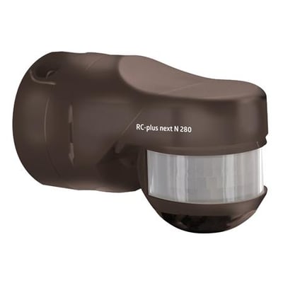 B.E.G. bevægelsessensor RC-Plus Next N 280 i brun plast med et 280 graders detekteringsområde.