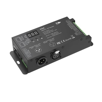 Sort DMX512-SPI-dekoder og RF-controller med display, knapper og tilslutninger, set skråt forfra.
