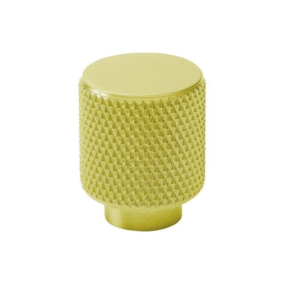 Gustavsberg K9 knop i messing med riflet overflade og en cylindrisk form, ideel til badeværelsesskabe.