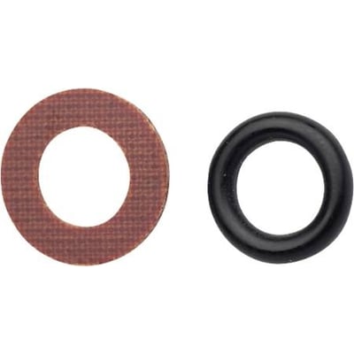 O-ringe med fiberskive fra IMI til radiatorventiler, vist som en sort ring ved siden af en brun fiberskive.