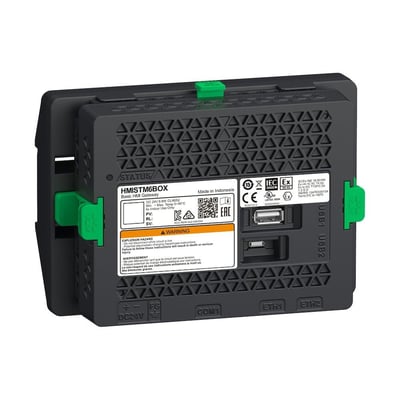 Bagside af Schneider Electric HMISTM6BOX modulær HMI skærm med mærkater, porte og DC24V/FG terminaler.
