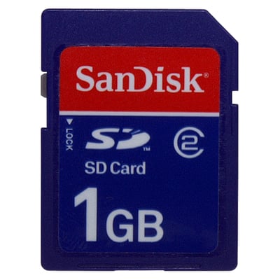 SanDisk SD-kort på 1GB med låsefunktion og mærkat til hukommelseskort med SP logo.