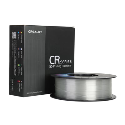 Creality CR-PETG-filament i transparent farve på sort spole ved siden af emballagen, 1,75 mm og 1 kg.