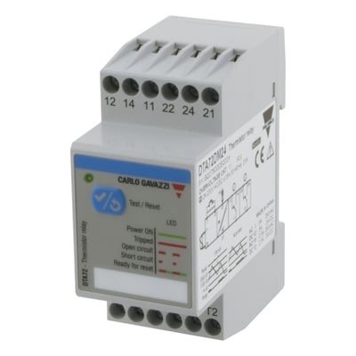 Carlo Gavazzi PTC-relæ i gråt DIN-skinnekabinet, set skråt forfra med resetknap og tilslutningsklemmer.