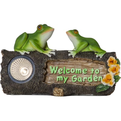 Nærbillede af Star Trading solcelle havefrøer med 'Welcome to my Garden' tekst, der viser detaljer ved frøerne og solcellelampen.