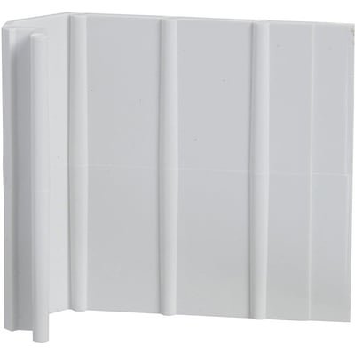 Nærbillede af Schneider Electric spændstykke til kanalstabilisering, hvid PVC med lodrette riller.