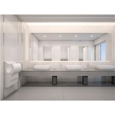 Philips CoreLine SlimDownlight, hvid indbygningslampe, ses monteret i loftet over håndvaske på et lyst badeværelse.