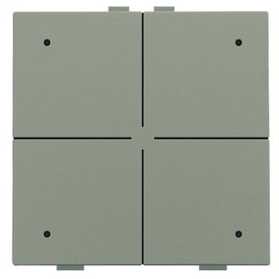 Top view af Niko 4-tryk med fire knapper, vist i bronze, med små monteringsdetaljer synlige.
