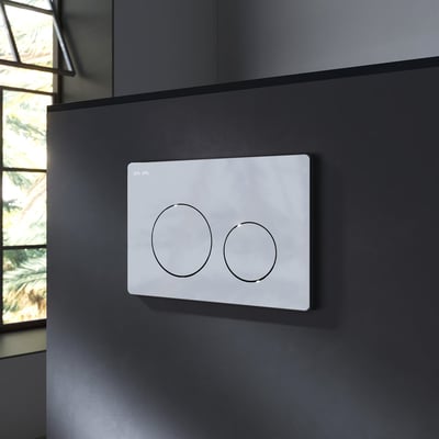 AM.PM Flush plate i krom til indbygningscisterne med to runde betjeningsknapper, monteret på mørk væg.