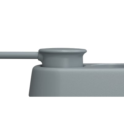 Nærbillede af en grå ColorCable stikdåse med rund stikprop og to udtag synlige på en hvid baggrund.