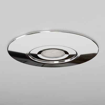 Ansell Lighting Prism Pro XM konverteringskit Ø170 mm i mat krom, med rund ring og central lysåbning set skråt forfra.