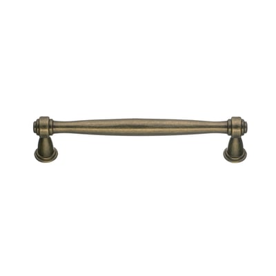 Beslagbodens bøjlegreb i antik messing med klassisk form og 128 mm centerafstand, set forfra.