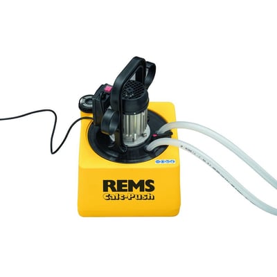 Rems Calc-Push elektrisk afkalkningspumpe set fra siden, med fokus på det sorte 3-vejs håndtag og pumpens motor. Pumpen er placeret på en hvid baggrund.