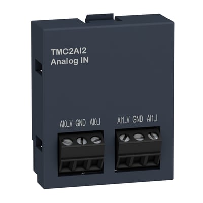 Detaljeret billede af Schneider Electric TMC2 analog indstikskortet, der viser de to sæt skrueklemmer med mærkninger for analoge input.