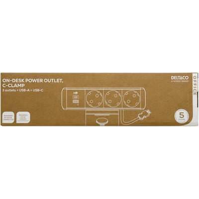 Deltaco OFFICE On-desk strømudtag med 3 stikkontakter, 1x USB-A og 1x USB-C port, monteret på C-klemme vist på brun papemballage.