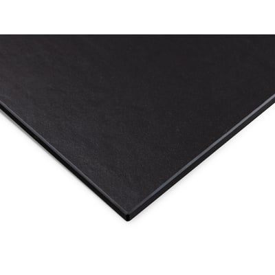 Tættere visning af Svedbergs sort bordplade med en let tekstureret overflade og slanke kanter.
