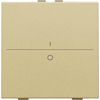 Niko tangent i guld med 'i' og 'o' symboler til 2-tryks betjening, perfekt til moderne boligindretning.