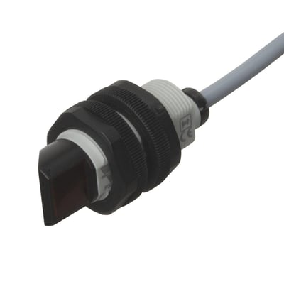 Carlo Gavazzi fotoelektrisk M18-sensor PA18CRP40NASA med sort front, hvidt gevindhus og gråt kabel.