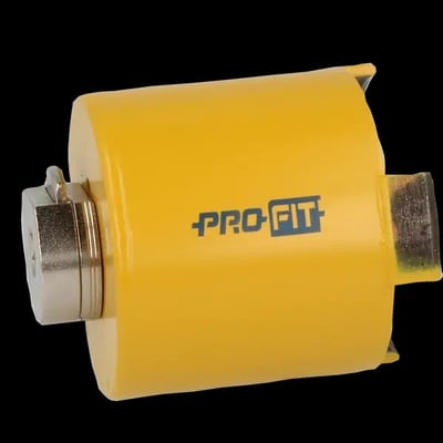 PRO-FIT beton hulsav på 127 mm i gul metal med PRO-FIT logo og adapter til boring i beton.