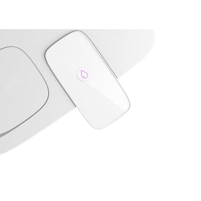 Nærbillede af den hvide Philips instant vandfilterkande med et lilla vanddråbe-ikon på den sorte, aftagelige låg.