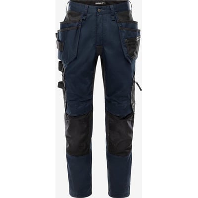 Fristads GWM 301018 håndværkerbukser i marineblå med sorte stretchpaneler og flere lommer, fremstillet af polyester og bomuld.