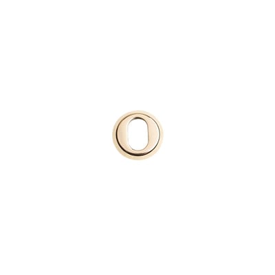Assa Abloy dækplade til kasselås i messing med rund yderside og aflang oval åbning, set forfra.
