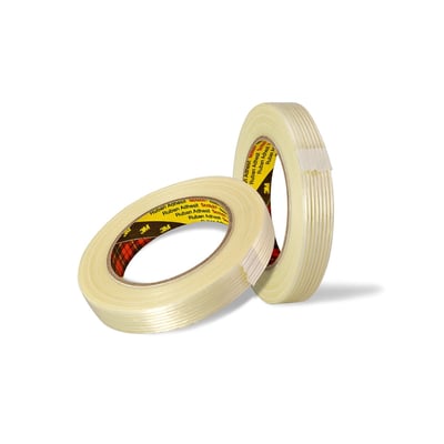 To ruller af 3M Filament tape 8959, 25 mm x 50 meter, klar, med synlige glasfiberforstærkninger på den lyse tape.
