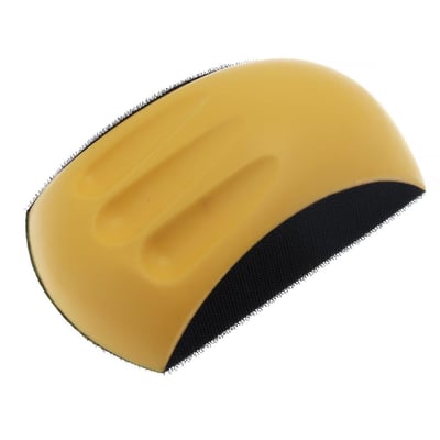 Gul håndslibeklods med sort velcroflade og ergonomisk buet greb, 90 x 150 mm.
