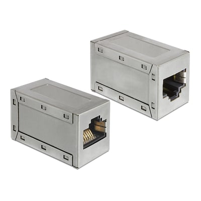 Sølvfarvet DeLOCK RJ45-modulkobling, skærmet Cat 6A, vist fra to vinkler med åbninger til stik i begge ender.