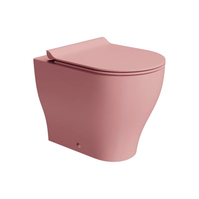 GSI Tono back-to-wall-toilet med geniusflush i mat lyserød, set skråt forfra med toiletsædet lukket.