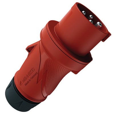 Mennekes PowerTOP Xtra R CEE-stikprop, 32 A og 4-polet, i rød og sort set skråt med kontaktåbningerne synlige.