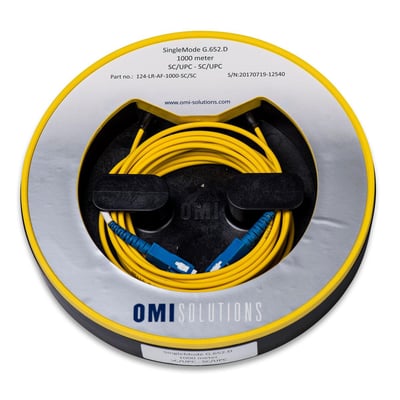 Magnetisk fiber test ring, 1000m SingleMode G.652.D med SC/UPC - SC/UPC konnektorer, i rund gul indpakning.