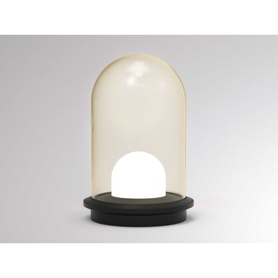 Molto Luce Pille Single L T bordlampe med champagnefarvet glas og sort aluminiumsfod med indbygget varmt hvidt lys.