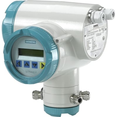 Siemens Sitrans FUE380 DN50 flowmåler i hvid og turkis med digitalt display og mærkat med tekniske specifikationer.