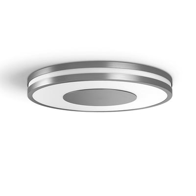 Philips Hue Being rund LED-loftslampe i aluminium med hvid lysflade og cirkelformet midte.