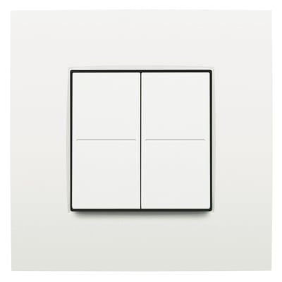 Niko lysdæmper til Hue-system med fire hvide knapper og sort ramme, monteret på en firkantet hvid plade.