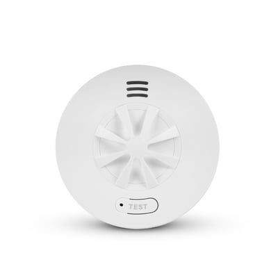 Hvid, rund Housegard Luma trådløs varmealarm med indbygget 10-års batteri og synlig testknap.