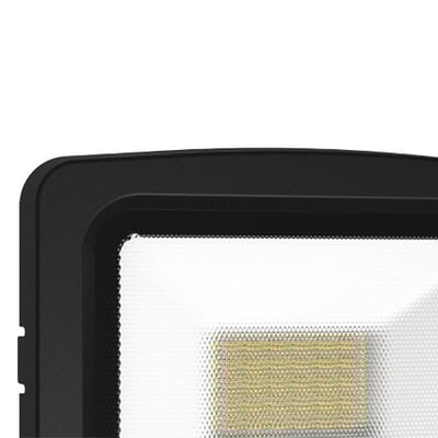 Detalje af Ansell Lighting Calinor Evo LED projektør i sort, viser den matte aluminiumsramme og den teksturerede polycarbonatfront med LED-panel.