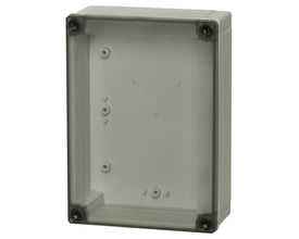 Detalje af Fibox MNX el-kasse set forfra, viser den gennemsigtige polycarbonat låg og lysegrå bund i materiale med slagfasthed.