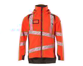 Detaljebillede af Mascot Hi-Vis skaljakke, der viser refleksdetaljer og den tofarvede konstruktion i rød og mørk antracit.