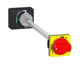 Schneider Electric drejegreb i rød og gul, vist med aksel og indikation for ON, OFF og Trip/Reset funktioner.