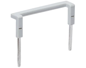 Grå jumper til relæstik med to ben, beregnet til forbindelser på spole- eller kontaktsider.