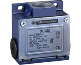 Detaljebillede af Telemecanique Sensors endestop krop med metalhus, der viser mærkat med specifikationer og mærker.