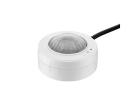 Philips Lighting Interact trådløs multisensor i hvid med rund, facetteret sensorlinse og tilsluttet kabel.
