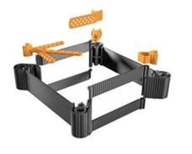 Weidmüller UH20-RPI-EXT sort Raspberry Pi housing adskilt med orange dele spredt omkring.
