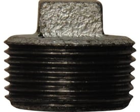 Galvaniseret prop med 1/2'' gevind og firkantet top. Prop er lavet af metal og har en grov, ru overflade.