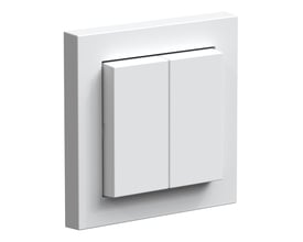 Hvid mat Ledvance kinetisk Zigbee-afbryder med fire knapper, set skråt forfra med kvadratisk ramme.