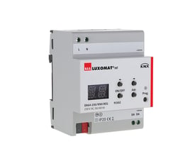Hvid B.E.G. DA64-230/KNX REG-gateway til KNX- og DALI-belysningsstyring med display, knapper og tilslutninger.